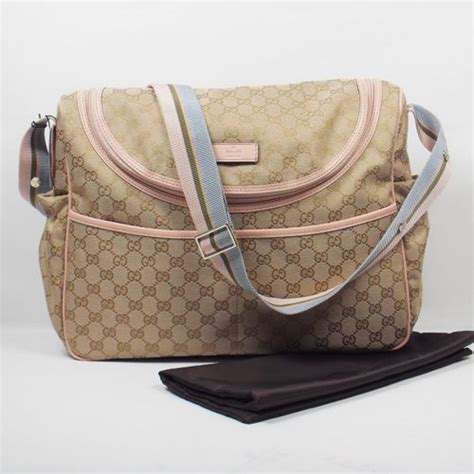 gucci vs prada diaper bag